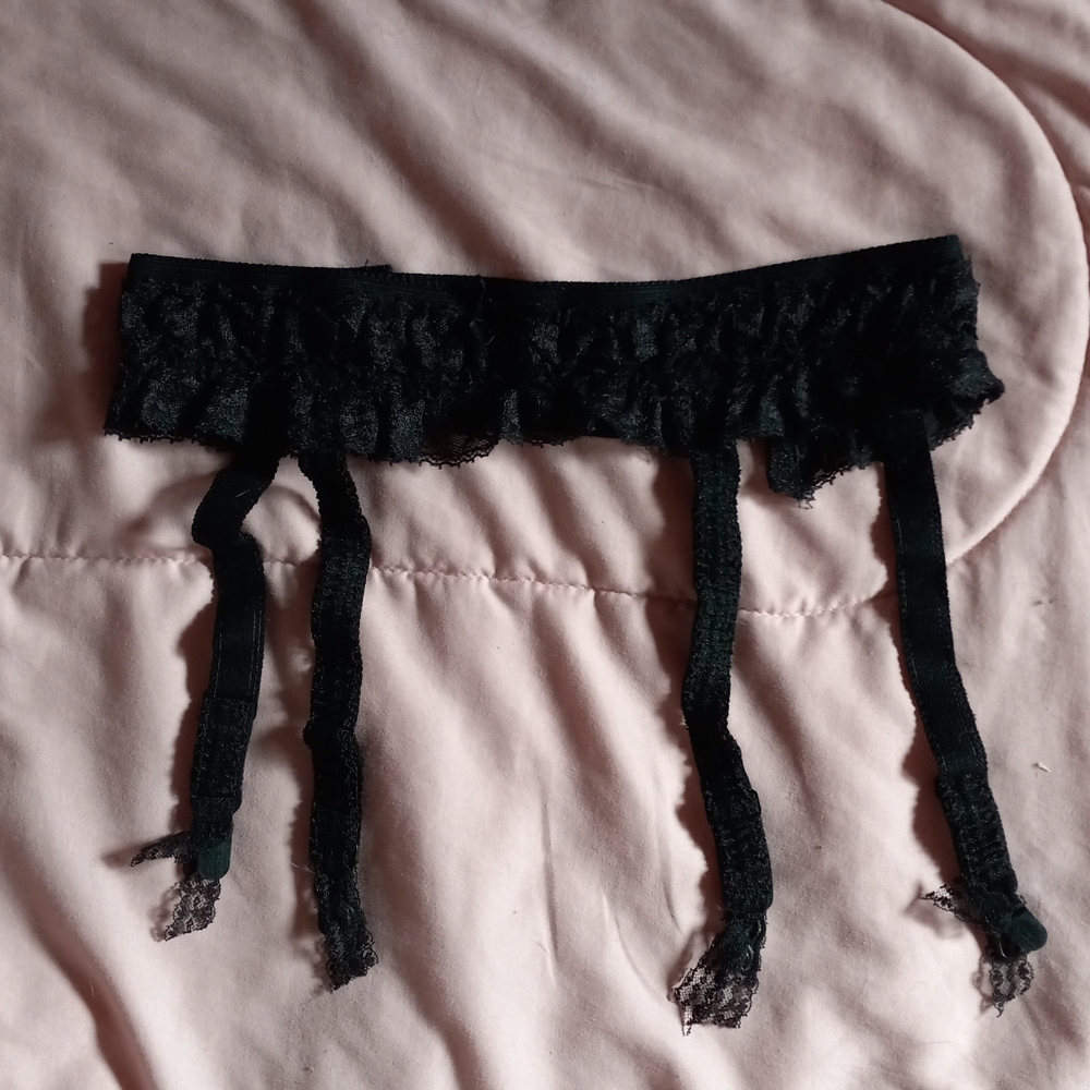 Vintage union made black garter belt by Young Look